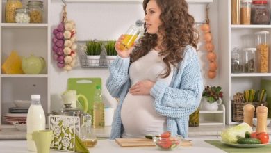 beautiful-pregnant-young-woman-having-breakfast-kitchen_484921-23028-3246765